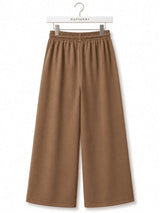 Back view of Nasseeb Women's Essence Trousers in camel brown