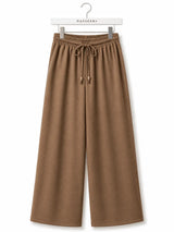 Front view of Nasseeb Women's Essence Trousers in camel brown