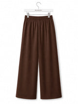 Back view of Nasseeb Women's Essence Trousers in chocolate brown