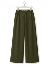 Back view of Nasseeb Women's Essence Trousers in olive green