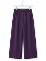 Front view of Nasseeb Women's Essence Trousers in purple