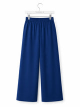 Back view of Nasseeb Women's Essence Trousers in royal blue